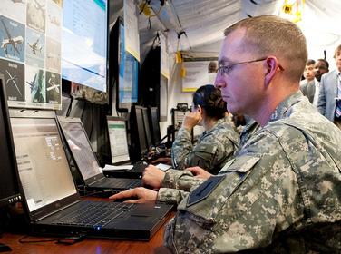 A soldier with the Army's intelligence community demonstrated use of a portion of the Army's Distributed Common Ground System