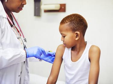 A boy getting a vaccination