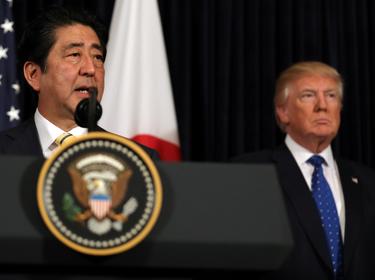 Japanese Prime Minister Shinzo Abe (left) delivers remarks on North Korea, accompanied by U.S. President Donald Trump at the Mar-a-Lago club in Palm Beach, Florida, February 11, 2017