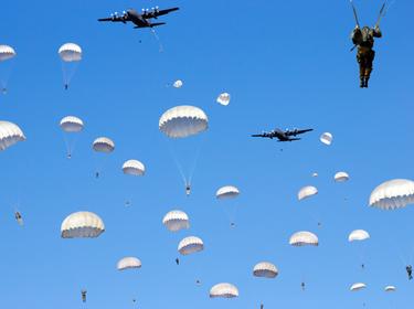 Paratroopers jumping out of a plane