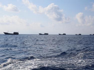 Chinese boats fish at the disputed Scarborough Shoal, April 5, 2017