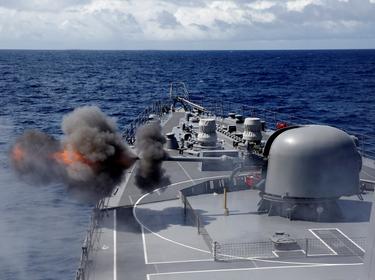 Japanese destroyer Inazuma test firing its 76-millimetre cannon in the Indian Ocean, September 27, 2018. Picture taken September 27, 2018