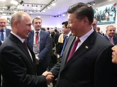 Russian President Vladimir Putin and Chinese President Xi Jinping meet on the sidelines of the G20 leaders summit in Buenos Aires, Argentina, December 1, 2018, photo by Sputnik/Mikhail Klimentyev/Kremlin via Reuters