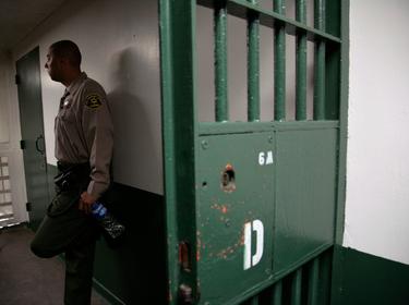 A Los Angeles County Sheriff's deputy stands watch at Men's Central Jail in Los Angeles, California, October 3, 2012, photo by Jason Redmond/Reuters