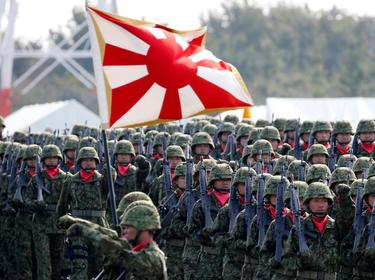 Members of Japan's Self-Defense Forces' infantry unit march during the annual SDF ceremony at Asaka Base, Japan, October 23, 2016, photo by Kim Kyung Hoon/Reuters
