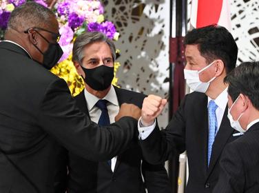 U.S. Defense Secretary Lloyd Austin and Secretary of State Antony Blinken with Japan's Defense Minister Nobuo Kishi and Minister for Foreign Affairs Toshimitsu Motegi at a joint press conference in Tokyo, March 16, 2021, photo by Yomiuri Shimbun/Reuters