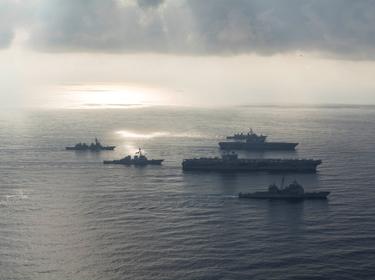 The Ronald Reagan Strike Group ships conduct an exercise with the Japan Maritime Self-Defense Force ships in the South China Sea, August 31, 2018