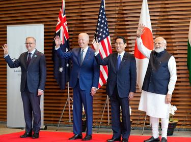 (l-r) Prime Minister of Australia Anthony Albanese, U.S. President Joe Biden, Prime Minister of Japan Fumio Kishida, and Prime Minister of India Narendra Modi pose for photos at the entrance hall of the Prime Minister's Office in Tokyo, Japan, May 24, 2022, photo by Zhang Xiaoyu/Pool via Reuters
