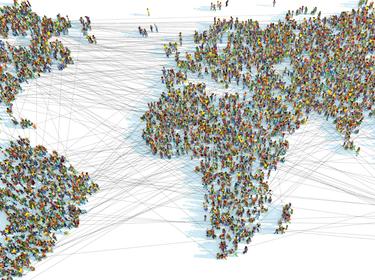 A world map consisting of thousands of connected people, photo by Christoph Burgstedt/Getty Images