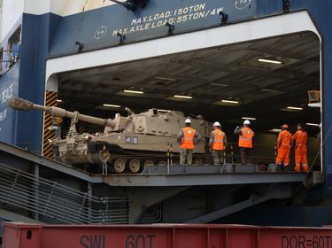 U.S. military logisticians and transporters offloading equipment at the port in Gdansk, Poland, July 8, 2021, photo By Sgt. Katelyn Myers/U.S. Army