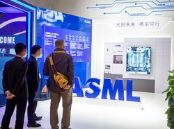 Visitors to the ASML booth during the 5th China International Import Expo in Shanghai, China, November 7, 2022, photo by CFOTO/Sipa USA via Reuters Connect