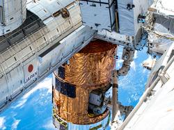 Japan Aerospace Exploration Agency's Kibo laboratory module is shown attached to the International Space Station
