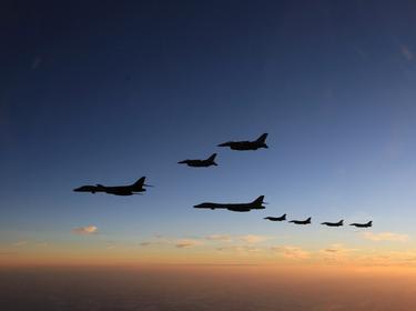 F-2 Fighters from the 8th Air Wing of Japan Air Self-Defense Force hold a joint military drill with the United States off Japan's southernmost main island of Kyushu, Japan, November 5, 2022, photo by Joint Staff Office of the Defense Ministry of Japan/Reuters