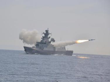 An Algerian corvette fires a Chinese-made anti-ship missile, photo by Hakim Djebbour/Wikimedia (CC by 4.0)