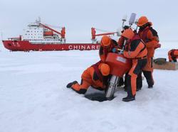 Members of China's research team setting up an ocean profiling float near the icebreaker Xuelong in the Arctic Ocean, August 18, 2016, photo by Wu Yue/Xinhua/Alamy