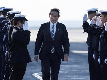 Japan's Prime Minister Fumio Kishida receives salutes from Japan Maritime Self-Defence Force soldiers at Sagami Bay, south of Tokyo, Japan, November 6, 2022, photo by Issei Kato/Reuters