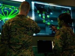 Marines with Marine Corps Forces Cyberspace Command observe computer screens in the cyber operations center at Fort Meade, Md., Feb. 5, 2020, photo by Marine Corps Staff Sgt. Jacob Osborne/U.S. Department of Defense