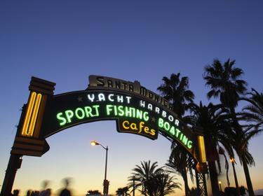 The entrance to the Santa Monica Pier at sunset