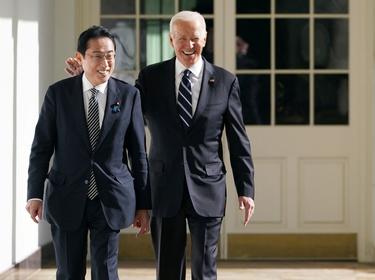 Japanese Prime Minister Fumio Kishida and U.S. President Joe Biden walk through the colonnade of the White House in Washington, D.C., January 13, 2023, photo by Mandel Ngan/Pool/Reuters