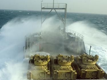 Waves crash over the side of U.S. Army Vessel Churubusco in the Persian Gulf Jan. 9 during a training mission named "Operation Spartan Mariner."