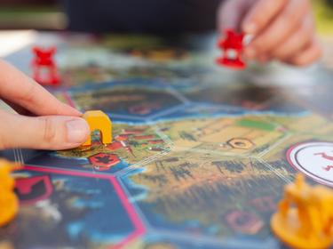 Two players playing wargame, photo by Alinsa/Adobe Stock