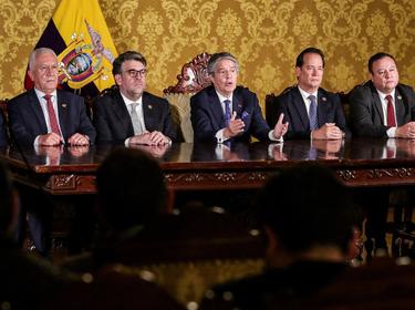 Ecuador's President Guillermo Lasso addresses the nation next to members of government, after he dissolved the National Assembly by decree, in Quito, Ecuador May 17, 2023, photo by Bolivar Parra/Ecuador Presidency/Handout via Reuters