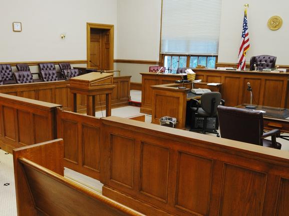 Overview of empty American courtroom, photo by dlewis33/Getty Images