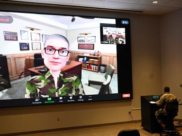 Demo of an AI-based app that allows participants to practice talking to superiors about difficult subjects and sharpen their leadership skills at the Agile Patriot conference at Wright-Patterson Air Force Base, Ohio, June, 2023, photo by Michele Donaldson/U.S. Air Force