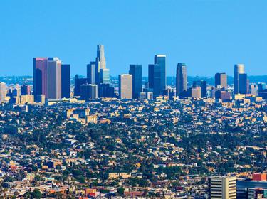 Los Angeles skyline and urban sprawl, photo by Ron and Patty Thomas/Getty Images